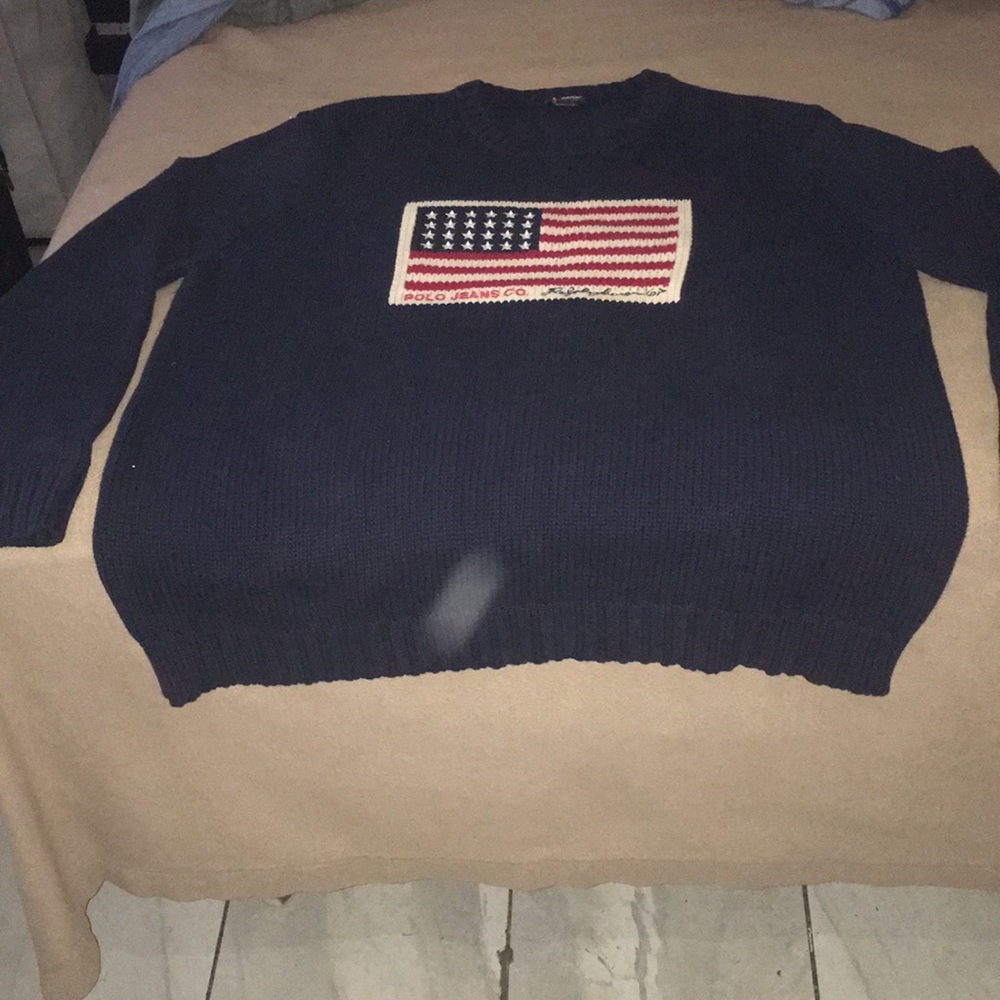 A male Polo Blue Sweater